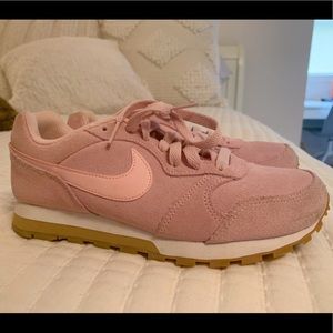 Pink leather Nikes